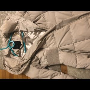 Long winter puffer coat Ivanka Trump S cream